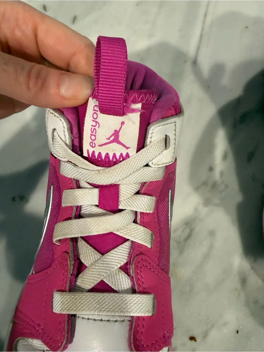 Jordan Pink and White Mid-Top Sneakers with Silver Swoosh